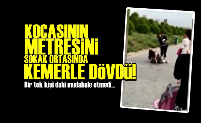 KOCASININ METRESİNİ KEMERLE DÖVDÜ!